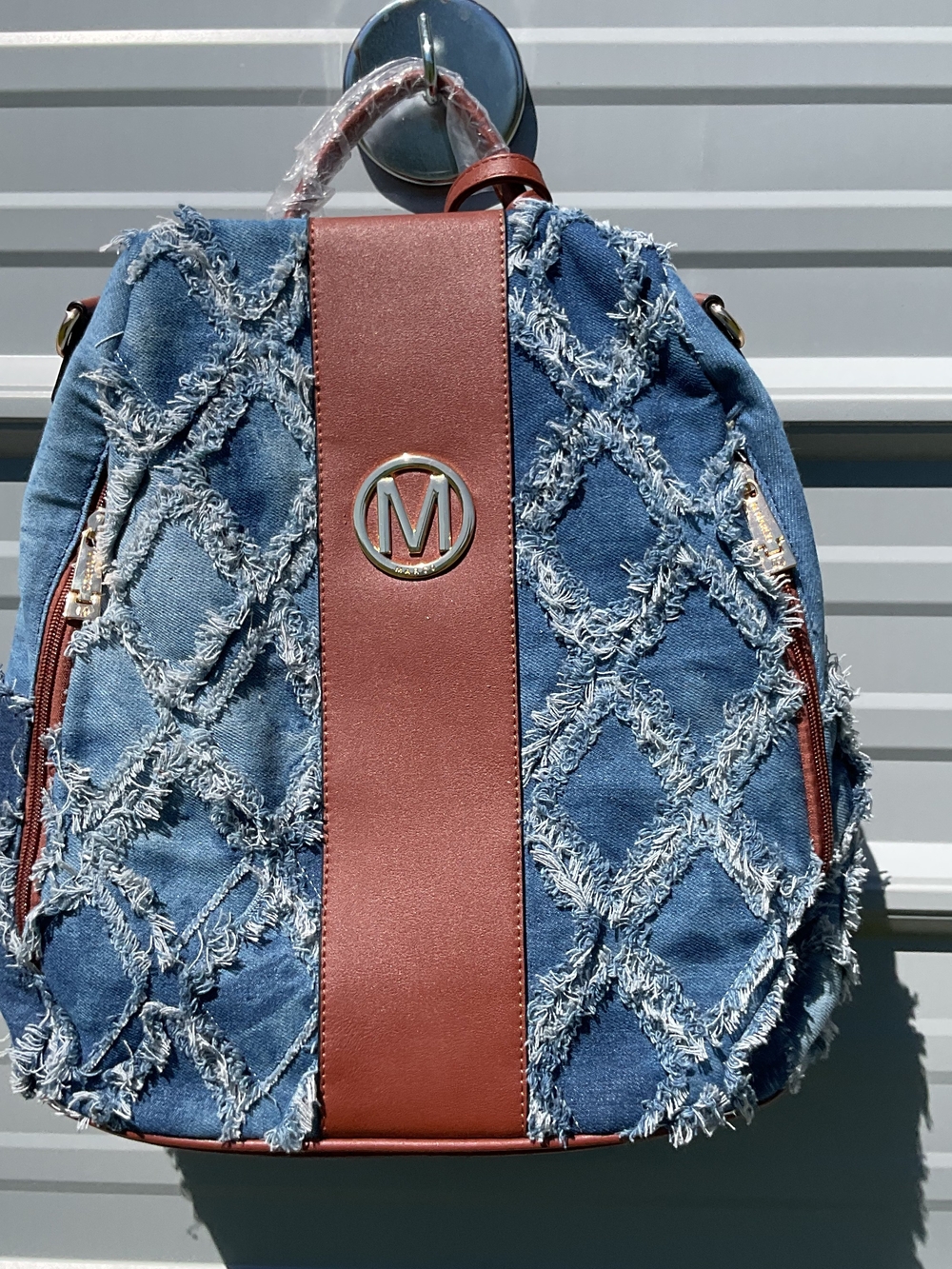 Denim Fringe Quilted Backpack with Brown Trim